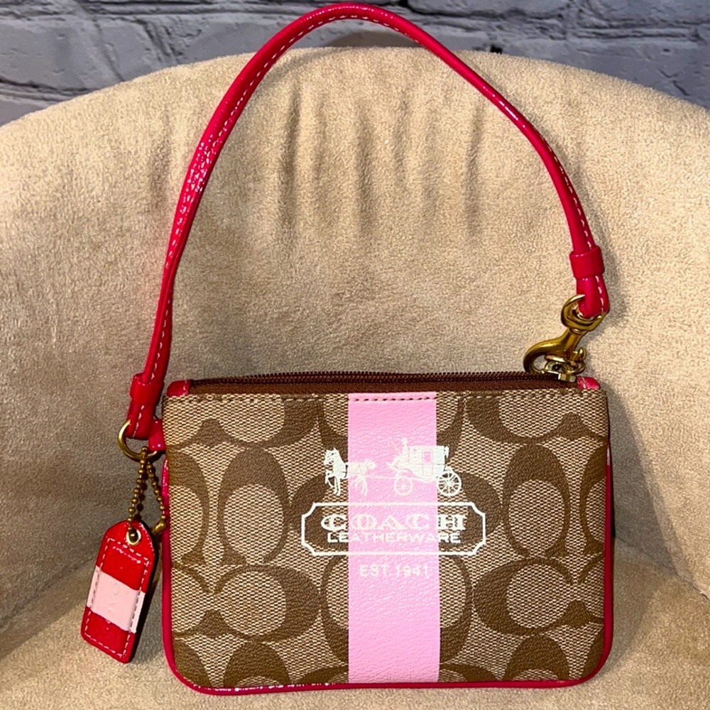 **SOLD**COACH HERITAGE KHAKI SIGNATURE WRISTLET BAG